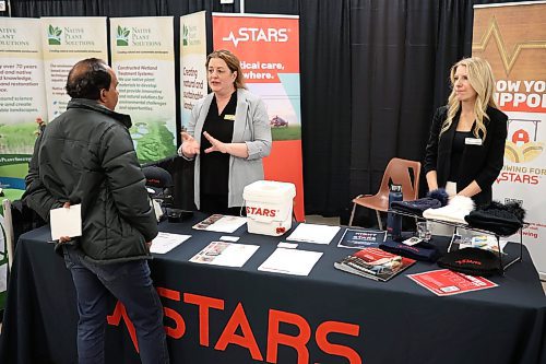 10042024
Community Engagement Officer Tracy Mowdy and Donor Relations and Development Officer Angele Cuthbertson, talk to a visitor to the STARS booth at the 2024 Association of Manitoba Municipalities Spring Convention at the Keystone Centre on Wednesday. 
(Tim Smith/The Brandon Sun)