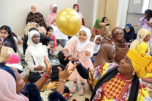 10042024
Two-year-old Azeemah Wasiudeen plays with a balloon with family members during a celebration for Eid al-Fitr, marking the end of Ramadan, at the Dome Building in Brandon on Wednesday morning. Hundreds of members of westman&#x2019;s Muslim community took part in the celebration.
(Tim Smith/The Brandon Sun)
