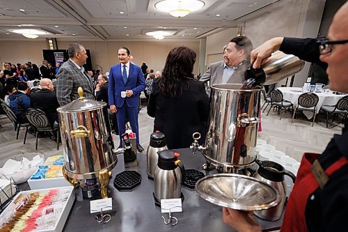 MIKE DEAL / FREE PRESS
Premier Wab Kinew chats with members of the Manitoba Multifaith Council during the organizations 9th annual Leadership Breakfast that is being held at the RBC Convention Centre Thursday morning.
240411 - Thursday, April 11, 2024.