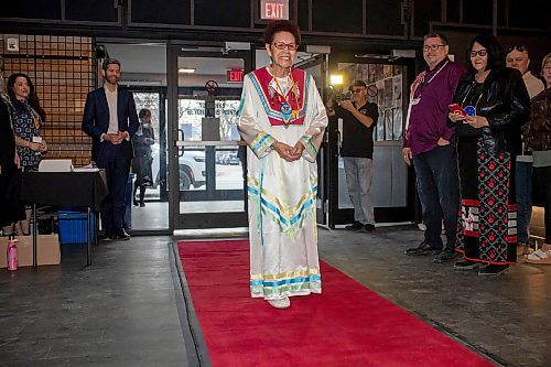 BROOK JONES / FREE PRESS
Elder Betty Ross walking the red carpet before the screening of Return to the Falls, which is a docudrama following the life story of Ross, who is residential school survivor, at the Park Theatre in Winnipeg, Man., Wednesday, April 10, 2024. The red carpet gala was hosted by Cross Lake First Nation and Black Badge Studios.