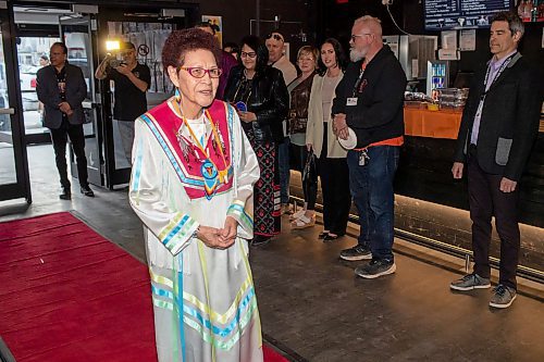 BROOK JONES / FREE PRESS
Elder Betty Ross walking the red carpet before the screening of Return to the Falls, which is a docudrama following the life story of Ross, who is residential school survivor, at the Park Theatre in Winnipeg, Man., Wednesday, April 10, 2024. The red carpet gala was hosted by Cross Lake First Nation and Black Badge Studios.