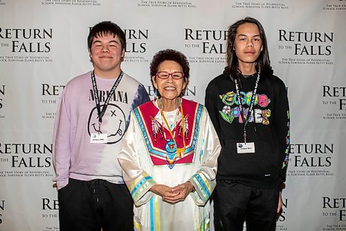 BROOK JONES / FREE PRESS
Elder Betty Ross (middle) with her grandsons Journey Ross (left) and Keyson Ross (right) at the red carpet gala during the screening of Return to the Falls, which is a docudrama following the life story of Ross, who is a residential school survivor, at the Park Theatre in Winnipeg, Man., Wednesday, April 10, 2024. The red carpet gala was hosted by Cross Lake First Nation and Black Badge Studios.