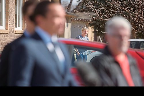 Mike Sudoma/Winnipeg Free Press
A neighbour listens in as Manitoba Premier Wab Kinew Announces the Homeowners Affordability tax credit announcement Friday morning press conference 
April 12, 2024