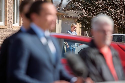 Mike Sudoma/Winnipeg Free Press
A neighbour listens in as Manitoba Premier Wab Kinew Announces the Homeowners Affordability tax credit announcement Friday morning press conference 
April 12, 2024