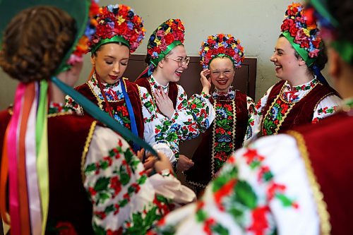 12042024
Dancers with Yorkton Kalyna Dance laugh backstage while preparing to perform during the first day of the Brandon Troyanda School of Ukrainian Dance Ukrainian Dance Festival at the Western Manitoba Centennial Auditorium on Friday. The Festival runs until Sunday.
(Tim Smith/The Brandon Sun)
