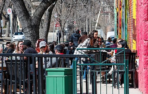 JOHN WOODS / FREE PRESS
People enjoy the spring weather on Corydon Avenue  Sunday, April 14, 2024. 

Reporter: tyler