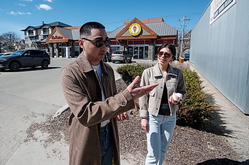 JOHN WOODS / FREE PRESS
James Sorza and Victoria Venture enjoy some ice cream and the spring weather on Corydon Avenue  Sunday, April 14, 2024. 

Reporter: tyler