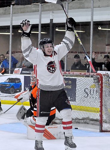 Taylor Sanheim (92) celebrates another Miniota-Elkhorn C-Hawks first period goal on Ste. Anne Aces goalie Travis Bosch (34) during Game 3 Sunday afternoon at Virden's Tundra Oil and Gas Place. The C-Hawks led 2-0 after 20 minutes, 4-0 after 40 minutes en route to a 6-2 triumph. (Photos by Jules Xavier/The Brandon Sun)