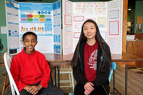 15042024
Aberehan Moges, a grade seven student at Christian Heritage School, and Angelina Zhang, a grade eight student at &#xc9;cole New Era School, with their respective science fair projects, Mood Foods; A Comprehensive Study Investigating the Impact of Nutrient-Rich Snacks on Cognitive Performance, Productivity and Mental Well-Being, and How Environmental and Genetic Factors Change the Chances of Getting Cancer. (Tim Smith/The Brandon Sun)