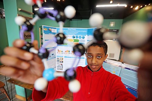 15042024
Aberehan Moges, a grade seven student at Christian Heritage School, with his science fair project Mood Foods; A Comprehensive Study Investigating the Impact of Nutrient-Rich Snacks on Cognitive Performance, Productivity and Mental Well-Being. (Tim Smith/The Brandon Sun)