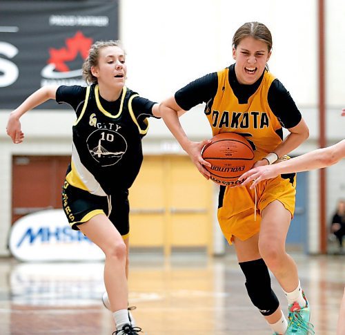 Madison Schettler, left, of Garden City Collegiate has committed to the Brandon University Bobcats for the 2024-25 Canada West women's basketball season. (Winnipeg Free Press)