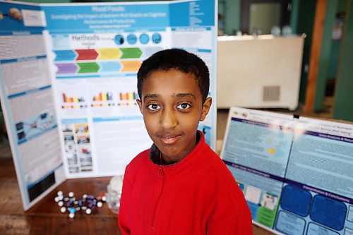 Abereham Moges, a Grade 7 student at Christian Heritage School, with his science fair project "Mood Foods; A Comprehensive Study Investigating the Impact of Nutrient-Rich Snacks on Cognitive Performance, Productivity and Mental Well-Being." (Tim Smith/The Brandon Sun)