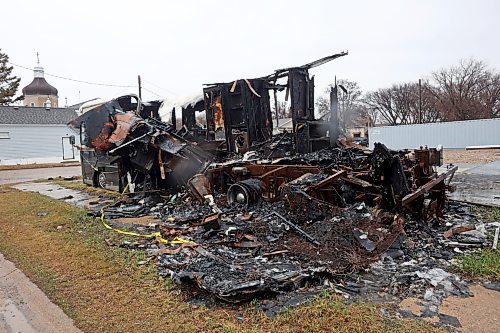 16042024
The burned-out wreckage of a recreational vehicle has been an eyesore along Assiniboine Avenue in Brandon for month&#x2019;s, with debris spilling onto a public sidewalk. 
(Tim Smith/The Brandon Sun)