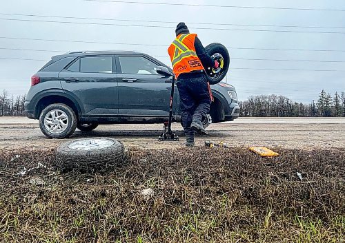 Ruth Bonneville / Free Press

Local -  Bishop pot hole

A CAA driver brings a spare tire to a vehicle after impact while flattened it Monday. 

A large pot hole in the right hand lane along Bishop Grandin Blvd. ust east of River Road, created a hazard for drivers causing some to get a flat tire upon impact which caused a backup of vehicles Monday.  



April 17th,  2024
