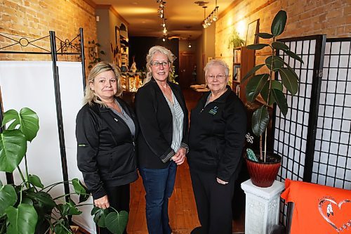 Westman Hospice Association treasurer Kristen White-van Diik (from left), vice-president Terri Miller and secretary Mae Lyon pose for photos after a meeting on Wednesday morning. Board members all share the same dream of one day having a “brick and mortar” permanent location for their clients receiving hospice care. (Tim Smith/The Brandon Sun)