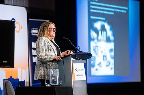 MIKAELA MACKENZIE / FREE PRESS

Keynote speaker Sarah Walker-Leptich, partner development manager at Amazon Web Services, speaks about AI at a Winnipeg Chamber of Commerce lunch at the RBC Convention Centre on Thursday, April 18, 2024.  

For Martin Cash story.