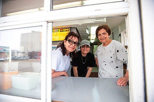 MIKAELA MACKENZIE / FREE PRESS

Mrs. Mikes operators Yvonne (left), Christina, and Cathy Mikos at the newly re-opened burger joint in St. Boniface on Thursday, April 18, 2024. 

For Gabby story.