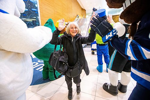 MIKAELA MACKENZIE / FREE PRESS

Aldene Rankin is greeted by nine local mascots as she arrives at the Winnipeg Richardson International Airport from Toronto on Friday, April 19, 2024. The event, put on by Tourism Winnipeg, was in celebration of Tourism Week.

Standup.