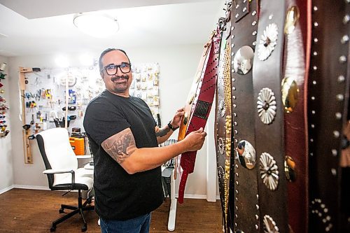 MIKAELA MACKENZIE / FREE PRESS

Cecil Sveinson of Buffalo Dancer Designs in his basement studio on Tuesday, April 16, 2024. Sveinson makes ceremonial belts for powwow dancers and other leather goods.

For AV story.