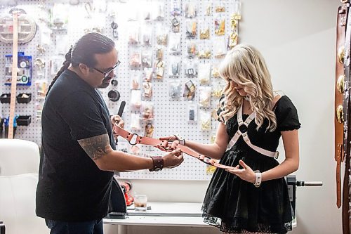 MIKAELA MACKENZIE / FREE PRESS

Cecil Sveinson, who makes leather goods, and his daughter, Shilo (17), on Tuesday, April 16, 2024. Shilo, who is into punk and goth, has started designing a line with him which caters to the Indigenous alternative community. 

For AV story.