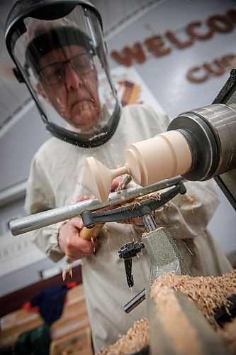 JOHN WOODS / FREE PRESS
Vern Crandell from the Woodturners Association of Manitoba turns a piece on a lathe at the Prairie Canada Carvers Association annual show at Pembina Curling Club Sunday, April 21, 2024. 

Reporter: s.u.