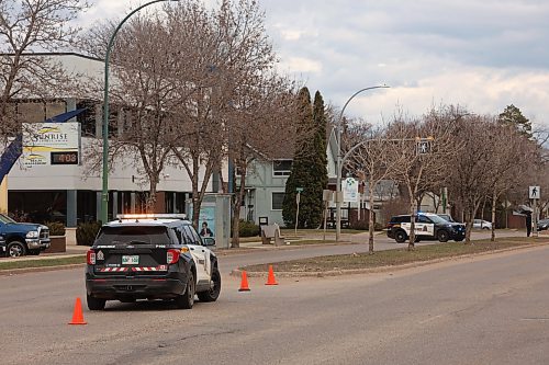 Brandon Police Service vehicles block a section of the westbound lanes of Victoria Avenue between 23rd and 25th streets on Monday after a four-year-old child was hit by a vehicle. Police don't anticipate charges will be laid against the driver. (Tim Smith/The Brandon Sun)