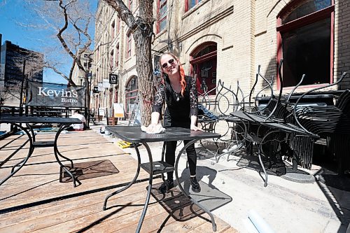 Ruth Bonneville / Free Press

Weather Standup

Courtney Hager, a server at Corrientes Argentine Pizzeria in the Exchange District, preps the patio area on Wednesday to be open by Friday afternoon,  just in time for the weekend, 

April 24th,  2024

