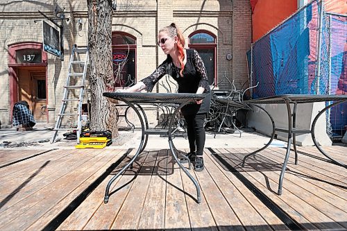 Ruth Bonneville / Free Press

Weather Standup

Courtney Hager, a server at Corrientes Argentine Pizzeria in the Exchange District, preps the patio area on Wednesday to be open by Friday afternoon,  just in time for the weekend, 

April 24th,  2024
