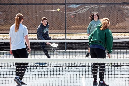 Sister Williams, Elder Malcom, Marie-Claude Palmer and Sister Kennerson play pickleball at the courts in Stanley Park on a warm Monday afternoon. Williams, Malcom and Kennerson are missionaries through The Church of Jesus Christ of Latter-day Saints, currently on mission in Brandon. (Tim Smith/The Brandon Sun)