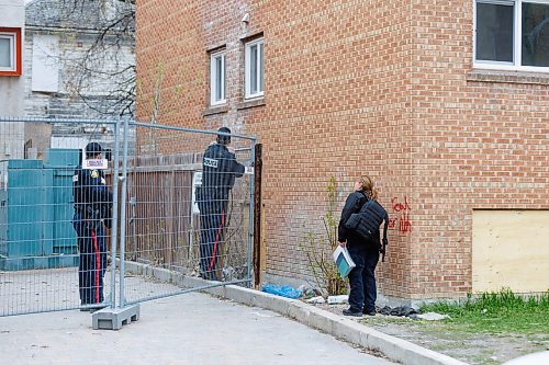 MIKE DEAL / FREE PRESS
Winnipeg Police Service officers at Centre Village, 575 Balmoral Street, where a deceased person was found shortly before the Manitoba government was to hold a housing announcement at the site.
See Erik Pindera story
240426 - Friday, April 26, 2024.