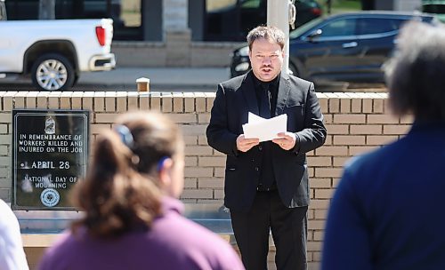 Kirk Carr, president of the Brandon and District Labour Council addressed a crowd of about 50 people during the National Day of Mourning ceremony held outside Brandon City Hall on Sunday. (Michele McDougall/The Brandon Sun)