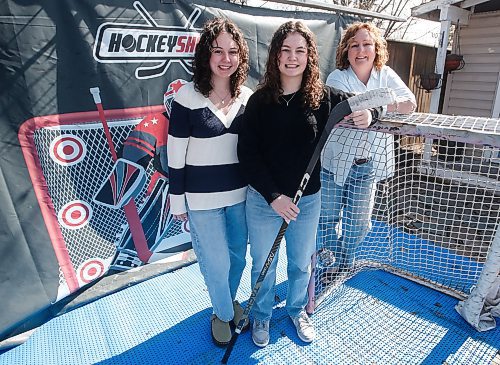 JOHN WOODS / FREE PRESS
Morgan Smith, a Balmoral Hall student who has received a NCAA scholarship, centre, is photographed with her sister, Madisyn and mother Shannon Sunday, April 28, 2024. 

Reporter: faith