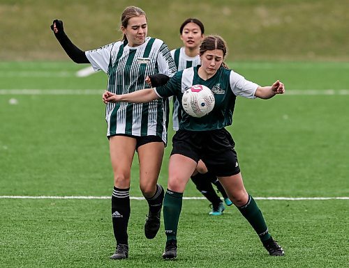 JOHN WOODS / FREE PRESS
Linden Christian Wings Lily Rempel (15), left, defends against St. Boniface Diocesan Centurions Heleyna Moniz (10) during first half action in the season opening exhibition varsity game at Ralph Cantafio Soccer Complex Monday, April 29, 2024. 

Reporter: ?