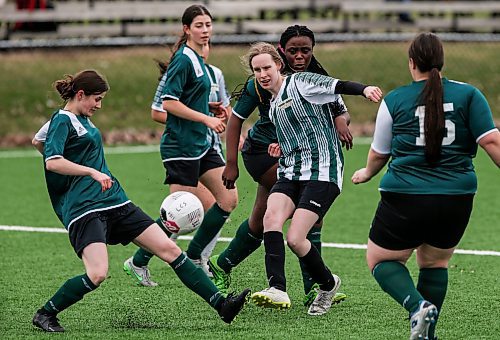 JOHN WOODS / FREE PRESS
St. Boniface Diocesan Centurions Anna Kolebaba (4), left,  defends against Linden Christian Wings Pauline Johnson (13) during first half action in the season opening exhibition varsity game at Ralph Cantafio Soccer Complex Monday, April 29, 2024. 

Reporter: ?