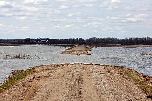 30042024
Flood water from the swollen Assiniboine River washes out a grid road off of Highway 250 north of Alexander on Tuesday.  (Tim Smith/The Brandon Sun)

