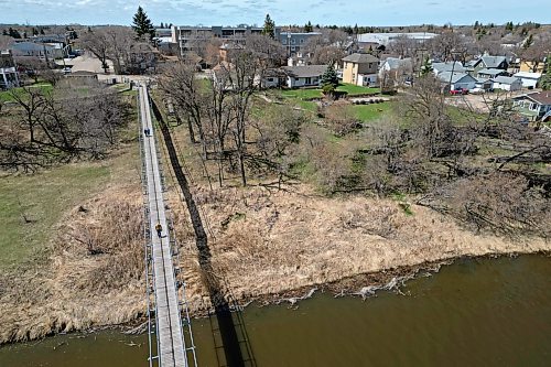 30042024
Pedestrians walk across the Souris Swinging Bridge over the Souris River on a sunny Tuesday afternoon. (Tim Smith/The Brandon Sun)
