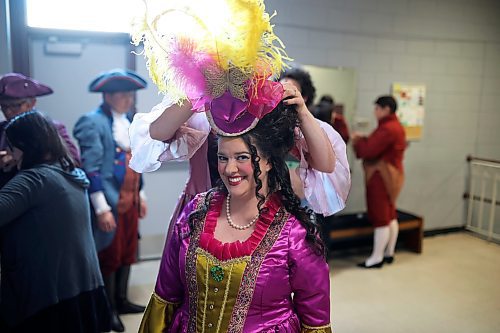 Emilie Cox, in character as Katherina, gets help with her outfit backstage before the dress rehearsal. (Tim Smith/The Brandon Sun) 