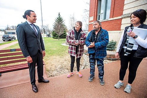 MIKAELA MACKENZIE / FREE PRESS

Premier Wab Kinew speaks with parents of Amanda, Nancy (left) and Melvin Clearwater, as Lisa Lehmann (right) listens after a funding announcement for Carman Wellness Connections and a memorial in Carman on Wednesday, May 1, 2024. 


For Erik story.