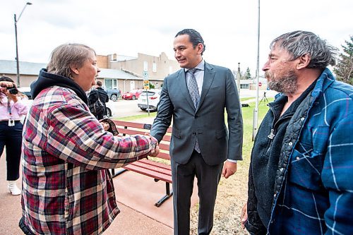 MIKAELA MACKENZIE / FREE PRESS

Premier Wab Kinew shakes hands with parents of Amanda, Nancy (left) and Melvin Clearwater, after a funding announcement for Carman Wellness Connections and a memorial in Carman on Wednesday, May 1, 2024. 


For Erik story.