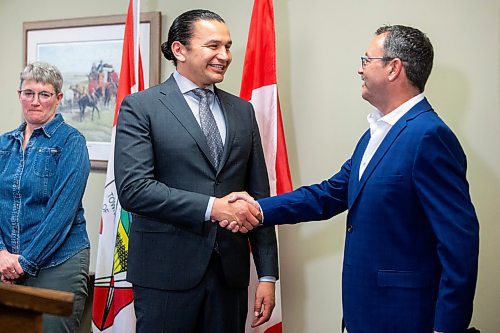 MIKAELA MACKENZIE / FREE PRESS

Premier Wab Kinew shakes hands with Carman mayor Brent Owen after announcing funding for Carman Wellness Connections and a memorial in Carman on Wednesday, May 1, 2024. 


For Erik story.