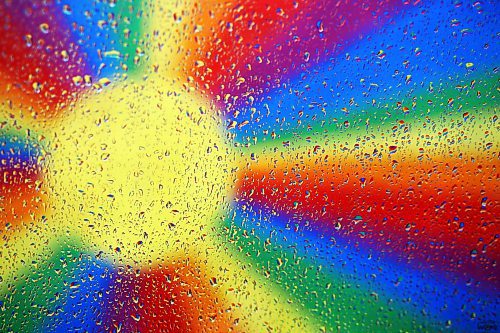 02052024
The colourful rainbow mural in an alleyway along Rosser Avenue in downtown Brandon is refracted by raindrops on a car window during showers on Thursday afternoon.
(Tim Smith/The Brandon Sun)