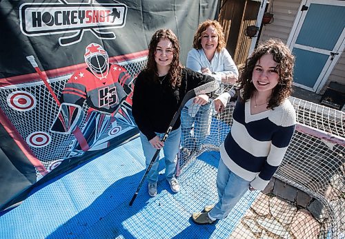 JOHN WOODS / FREE PRESS
Morgan Smith, a Balmoral Hall student who has received a NCAA scholarship, left, is photographed with her sister, Madisyn and mother Shannon Sunday, April 28, 2024. 

Reporter: faith

