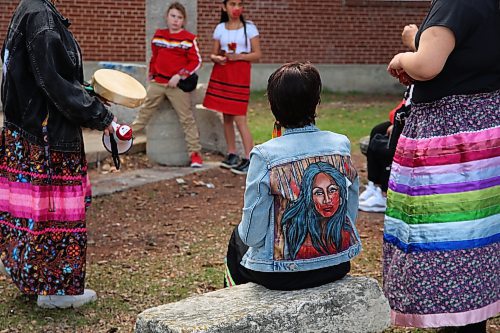 Painted demin jacket worn by a participant in Sunday's march from Brandon City Hall to Princess Park. (Charlotte McConkey/The Brandon Sun)