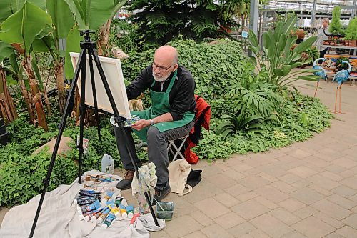 Sandy Black with his painting supplies at The Green Spot. (Charlotte McConkey/The Brandon Sun)