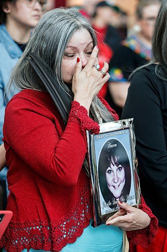 JOHN WOODS / FREE PRESS
Gerri Lee Pangman, holding a photo of her murdered sister Jennifer Dawn MacPherson, wipes a tear as Minister Nahanni Fontaine announces $15 million for a MMIWG2S Endowment Fund at the Canadian Museum for Human Rights in Winnipeg, Sunday, May 5, 2024.

Reporter: tyler