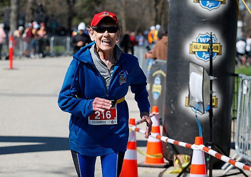 JOHN WOODS / FREE PRESS
Beth Taylor Greig, 72, finishes the WPS half marathon at Assiniboine Park  in Winnipeg, Sunday, May 5, 2024.

Reporter: standup