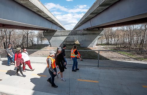 JOHN WOODS / FREE PRESS
Britt Moberg, red, friends, family and the Bear Clan searched near the Red River and Chief Peguis Trail for the remains of her father Earl Morberg who disappeared late December when he wandered away from his home in Winnipeg, Sunday, May 5, 2024.

Reporter: tyler