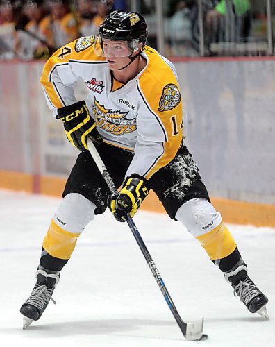 Right: Ty Lewis of the Brandon Wheat Kings plays the puck during pre-season game against the Regina Pats at Westman Place. When you follow Nolan Patrick, Kale Clague and Tanner Kaspick in the 2013 WHL draft, Ty Lewis with the 47th overall pick, you’ve hit a home run. It was a great draft for the Wheat Kings. (Photos by Tim Smith/The Brandon Sun)