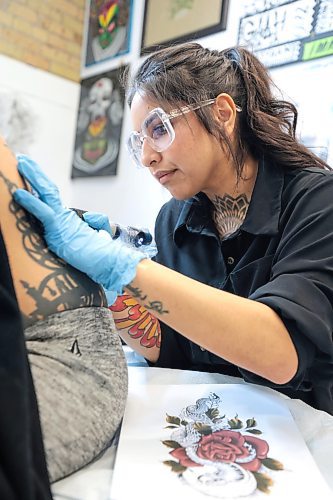 Ruth Bonneville / Free Press

49.8 The Creators - Tattoo artist

Photos of tattoo artist, Osheen Dhiman, as she works on a tattoo in her space at Ink Noir . 

Dhiman, 29, qualified as an architect in Punjab, India, where she is originally from. Whilst she&#x2019;d always wanted to be a tattoo artist, parental and cultural pressure forced her to pursue a more traditional career. Undeterred Dhiman took on  art jobs on the side,  whilst studying architecture, to pay for her apprenticeship with an Indian tattoo artist. Dhiman moved to Canada three years ago and has been working at Ink Noir for two years now. 

See Story by AV Kitching

May 6th,  2024

