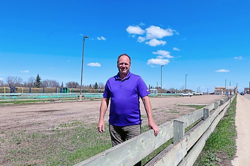 Phil Greenwood stands in front of properties he's buying from the City of Brandon for $1 on Pacific Avenue where he plans to build a new indoor pickleball and tennis facility this year. Greenwood already operates two indoor pickleball facilities in Regina and Saskatoon. (Colin Slark/The Brandon Sun)